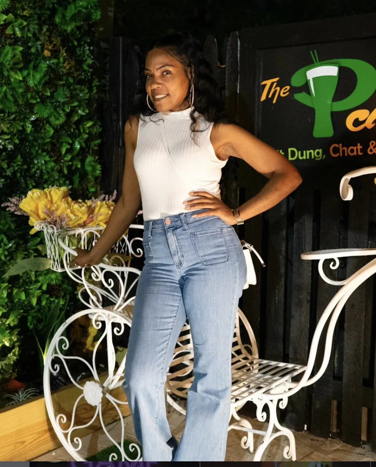 Kayan, founder of The Patio, standing inside the lounge